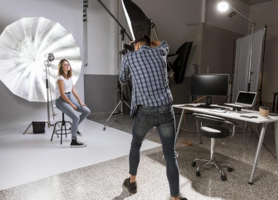 Fashion photographer in a studio setup