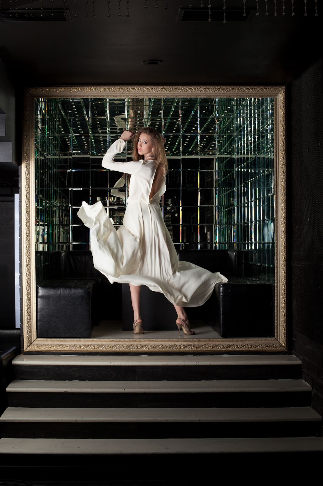 Photo of a model demonstrating the frame within a frame photography composition technique