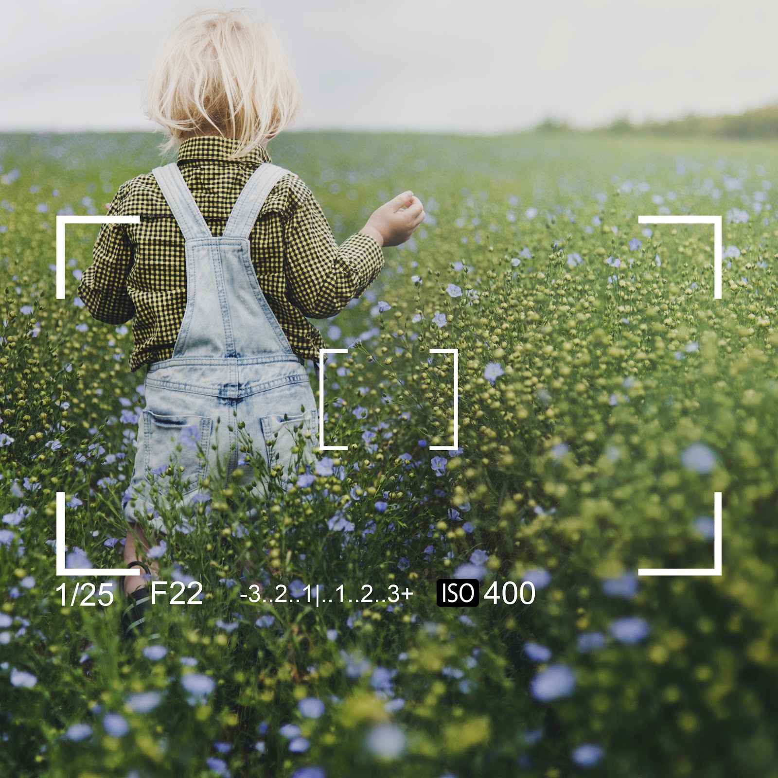 Child running through a colorful meadow