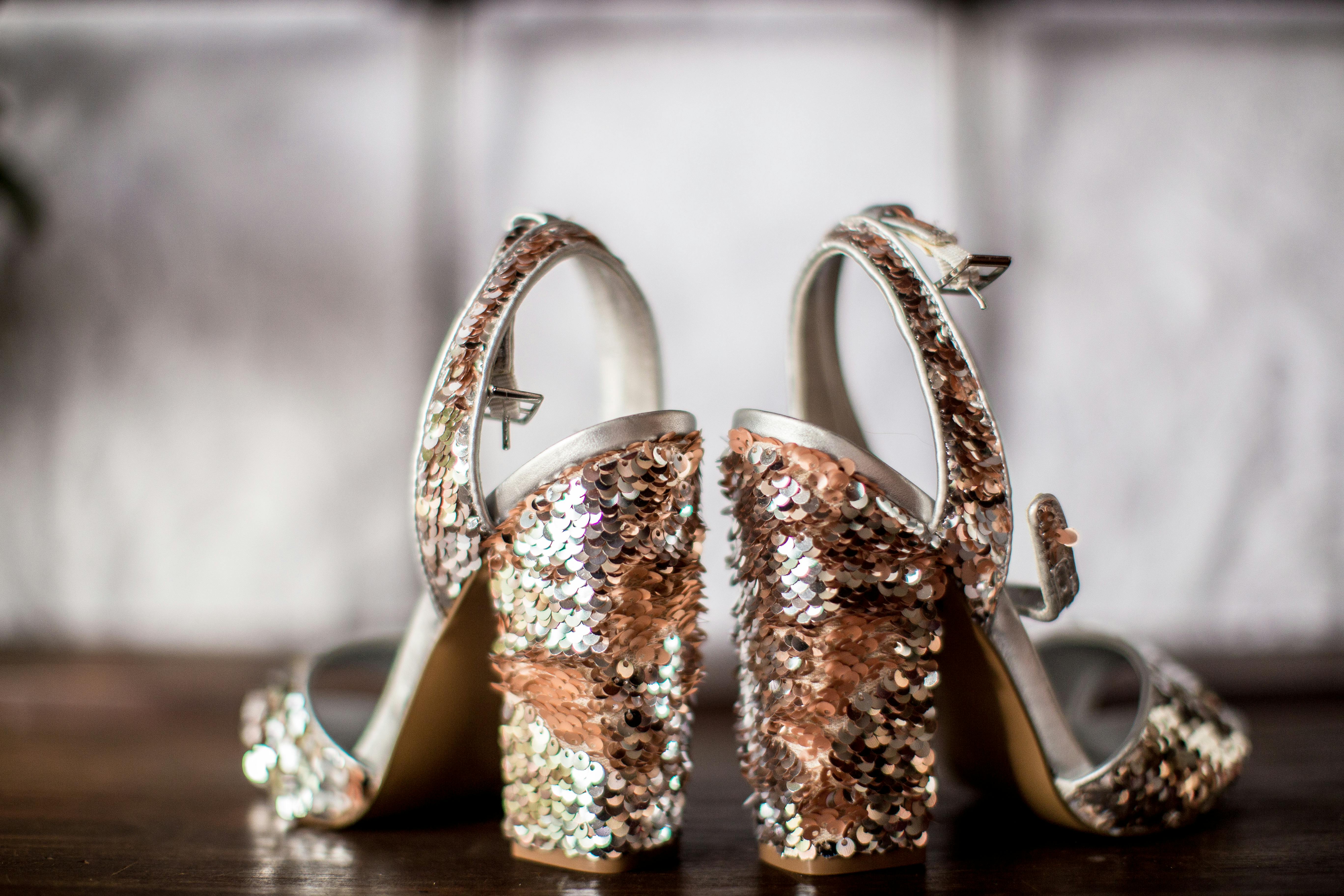 Selective Focus Photography of Silver and Bronze Colored Sandals